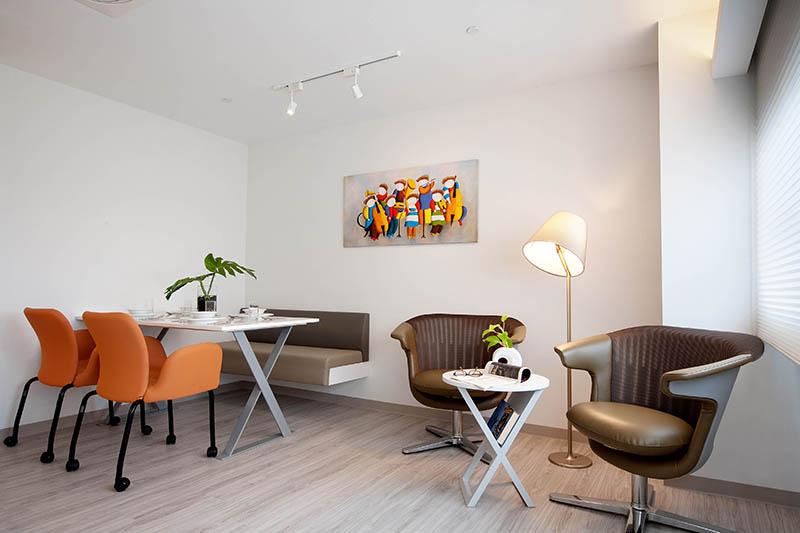 Well-lit Living and Dining area with chairs in our 2 Bedroom Apartment